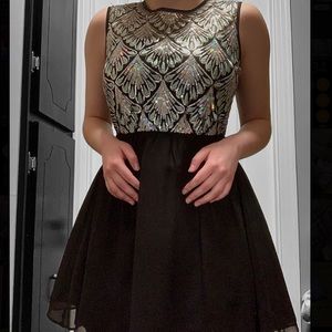 Black & Grey Cute Holographic mini Dress!! Size small. Not sure of the brand